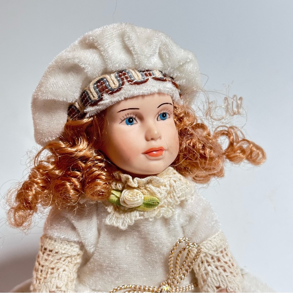 Vintage Porcelain Doll. 9 inches tall. Mid century. Good condition.